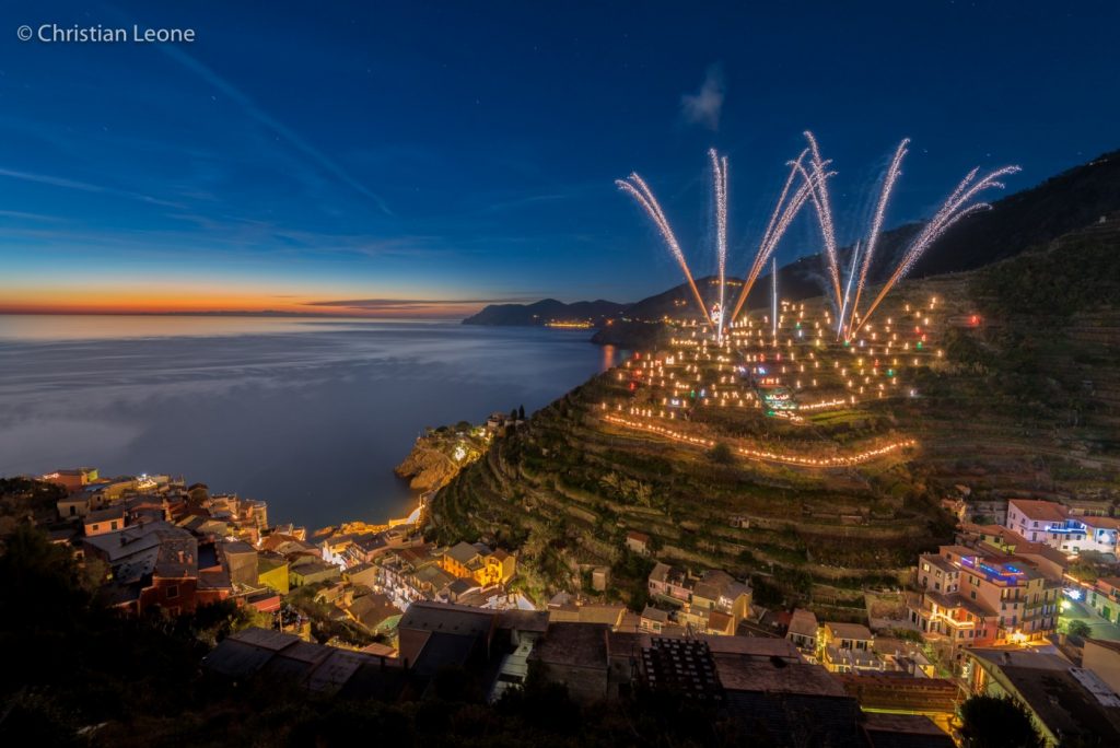 An entire hill lit up with the classic nativity scene - Manarola, Cinque Terre